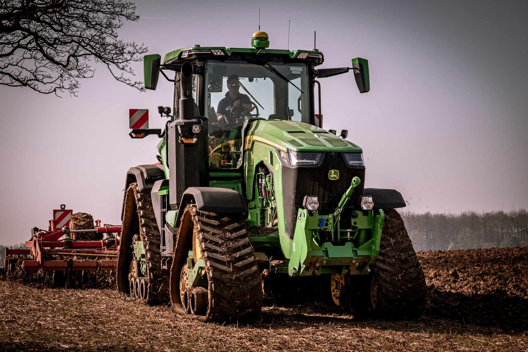 Culvating Ahead Of Spring Barley John Deere 8RX 1